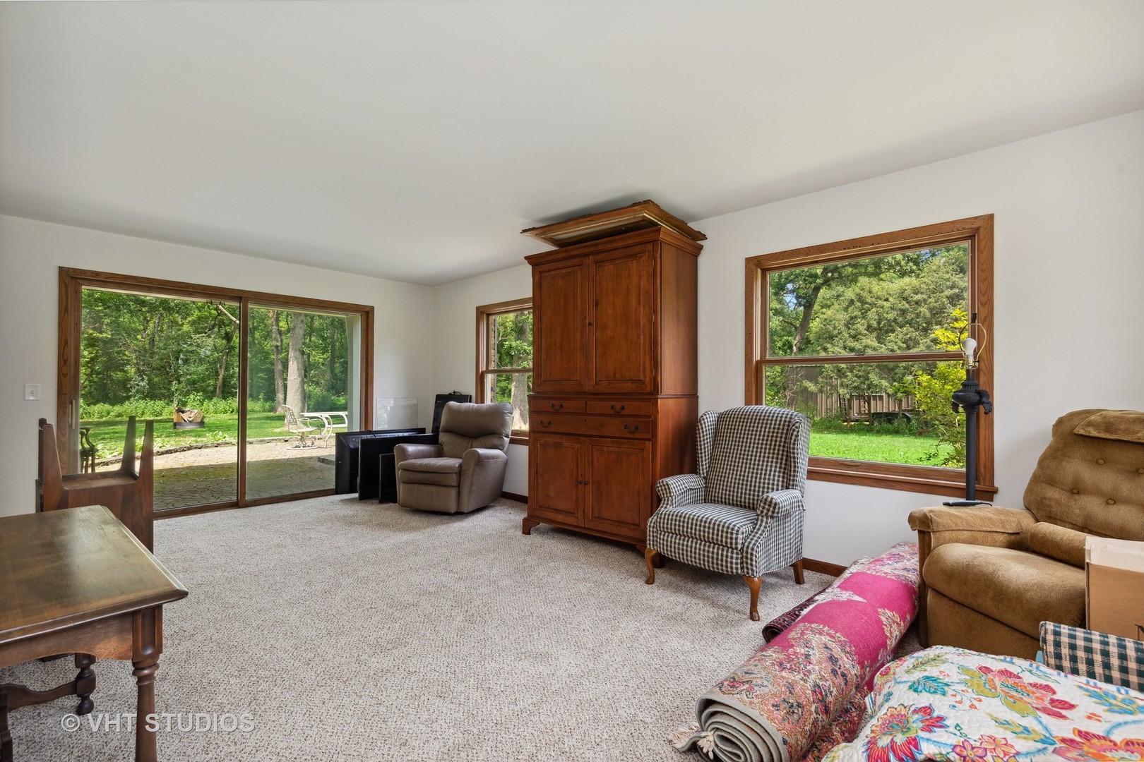14933 Mill Road Capron, IL 61012 - Photo 3 of 15 a living room with furniture and a large window