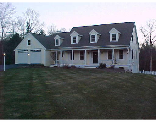 442 Carpenter Road Northbridge, MA 01588 - Photo 1 of 1 a front view of a house with a garden