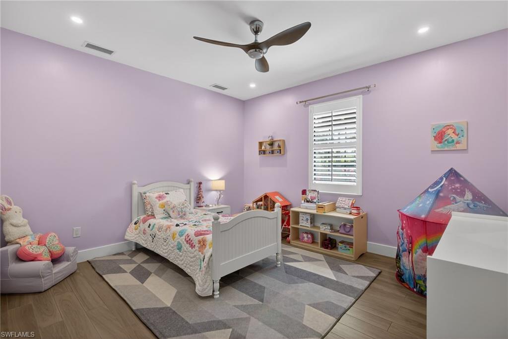 5577 Lancewood Way Naples, FL 34116 - Photo 23 of 44 a bedroom with furniture and a window