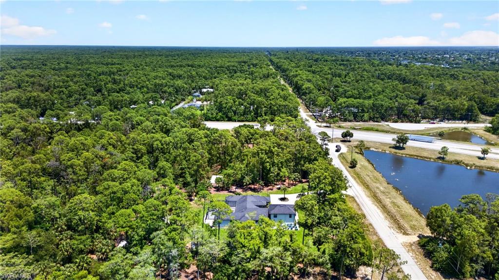 5577 Lancewood Way Naples, FL 34116 - Photo 42 of 44 a view of a garden
