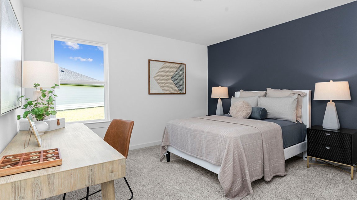 6004 Cherry Mdws Street Rosenberg, TX 77469 - Photo 14 of 39 a bedroom with a bed and a couch