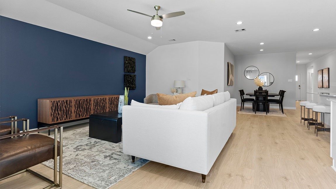 6004 Cherry Mdws Street Rosenberg, TX 77469 - Photo 20 of 39 a living room with furniture and a dining table