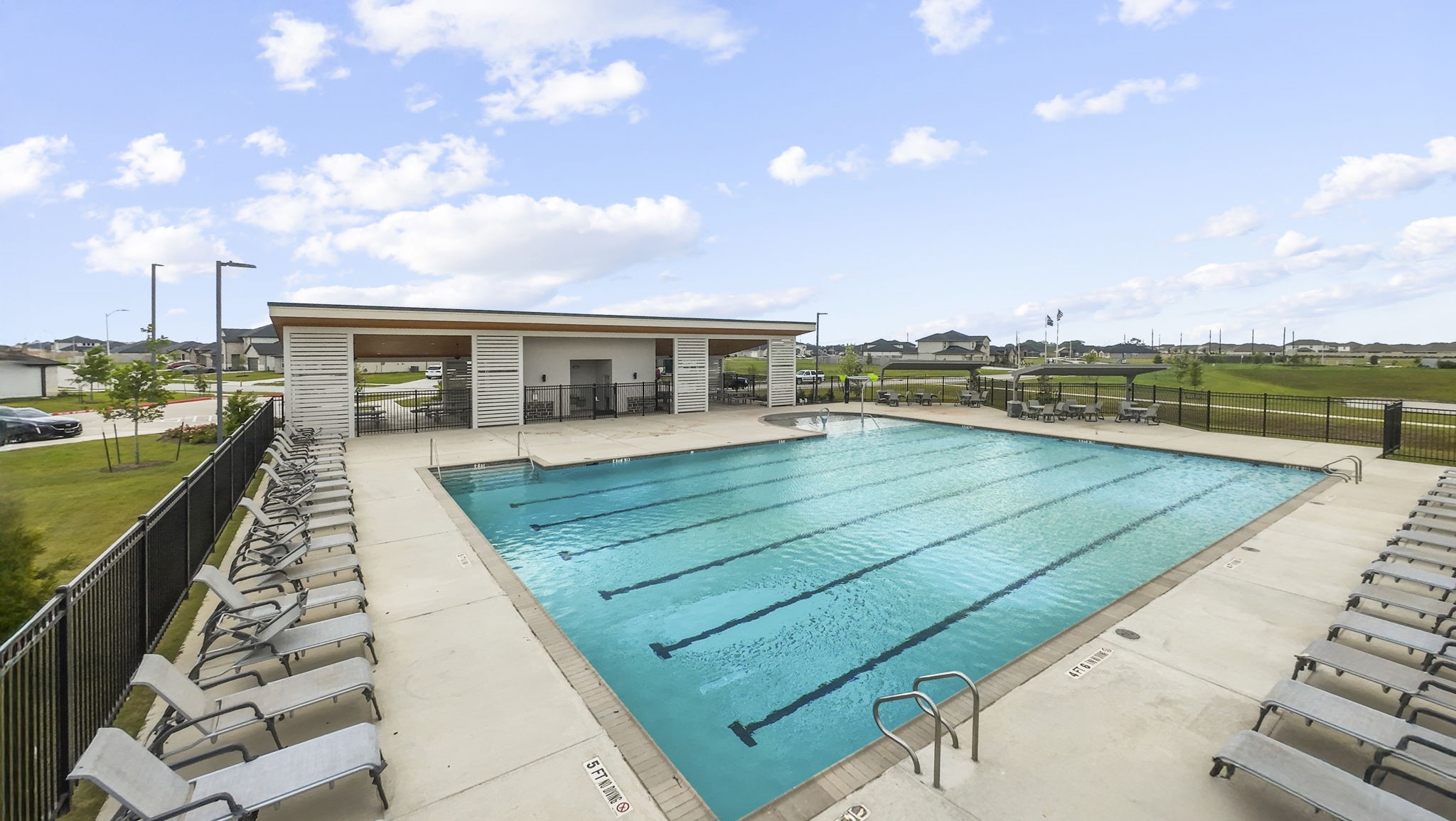 6004 Cherry Mdws Street Rosenberg, TX 77469 - Photo 33 of 39 swimming pool with outdoor seating and city view