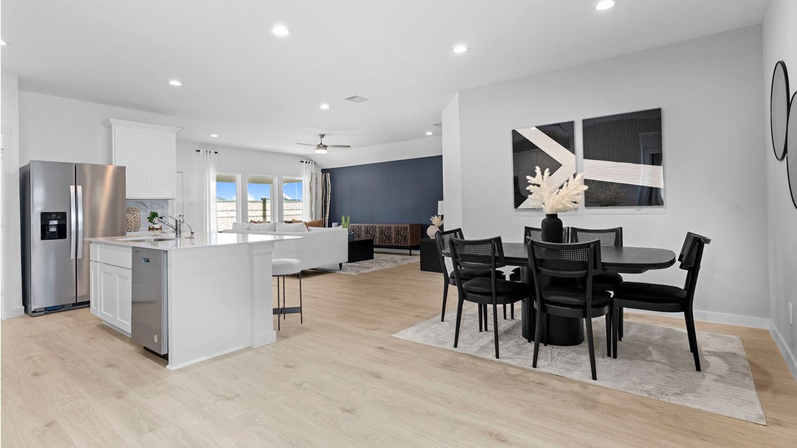 6004 Cherry Mdws Street Rosenberg, TX 77469 - Photo 10 of 39 a large kitchen with a table and chairs