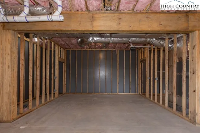 a view of large room with wooden walls