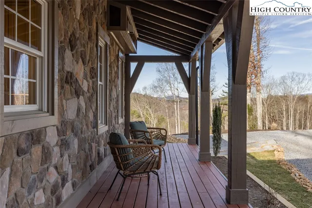 a view of roof deck with patio