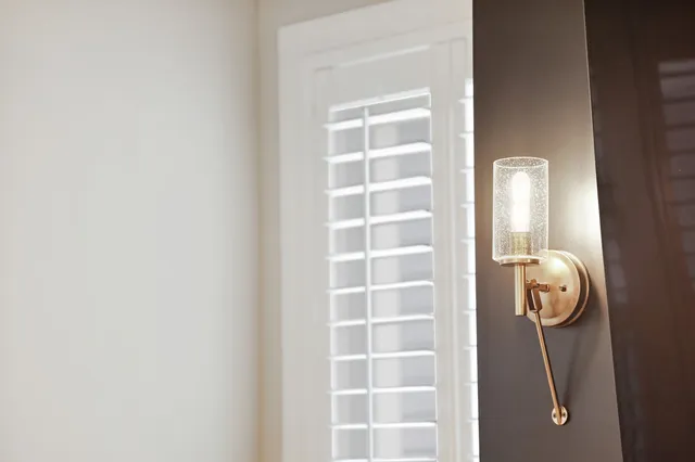 a view of a storage and utility room with washer and dryer