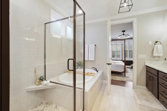 a bedroom with a bed and a chair