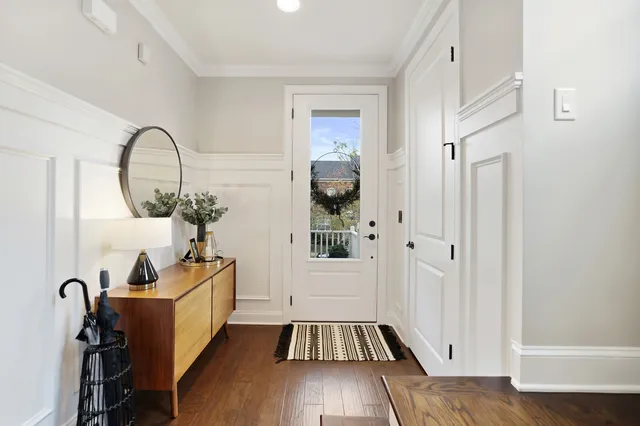 a view of a hardwood floor and wardrobe