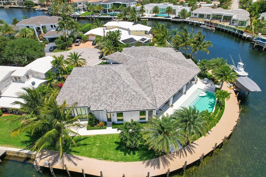 2550 Northeast 31st Court Lighthouse Point, FL 33064 - Photo 3 of 84 an aerial view of a house with a lake view
