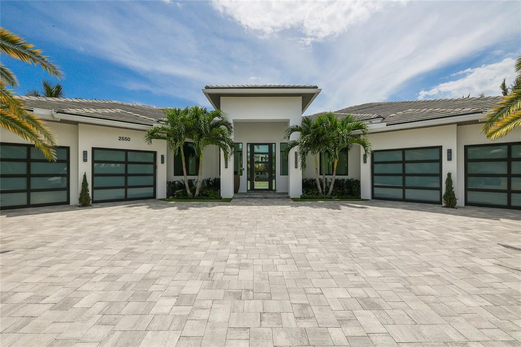 2550 Northeast 31st Court Lighthouse Point, FL 33064 - Photo 5 of 84 a view of a house with a garage