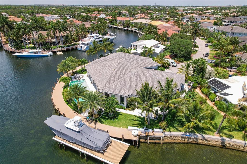 2550 Northeast 31st Court Lighthouse Point, FL 33064 - Photo 79 of 84 an aerial view of residential house with outdoor space and lake view