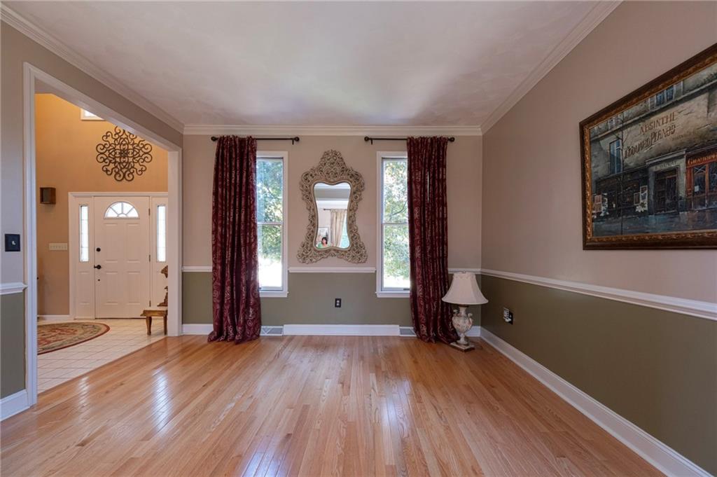 309 Jefferson Street Export, PA 15632 - Photo 20 of 43 a view of livingroom with hardwood floor and window