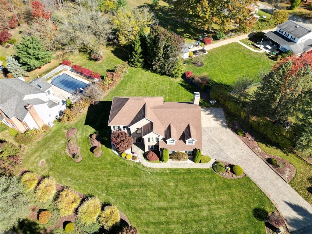 309 Jefferson Street Export, PA 15632 - Photo 42 of 43 an aerial view of a house with garden space and street view