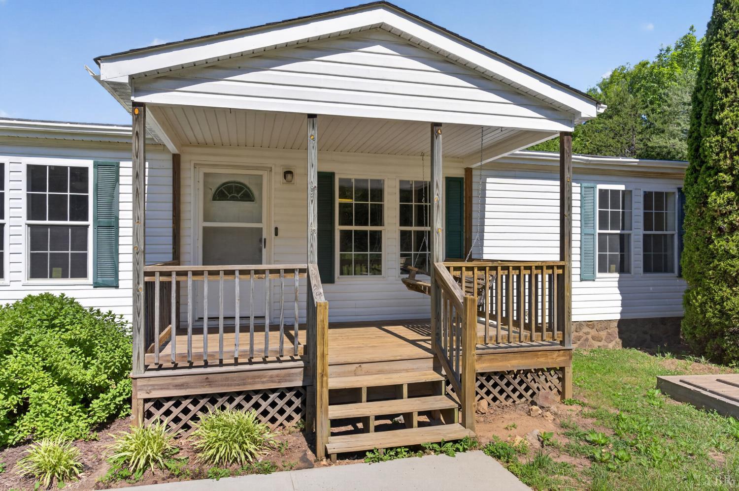 1811 Mohawk Road Gladys, VA 24554 - Photo 3 of 51 front view of a house with a porch