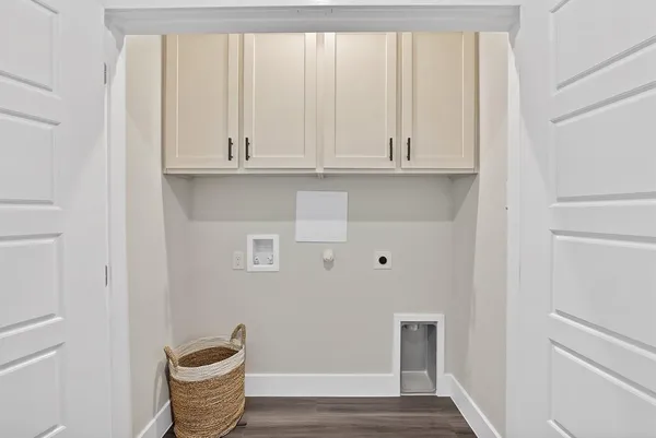 a view of room with wooden floor
