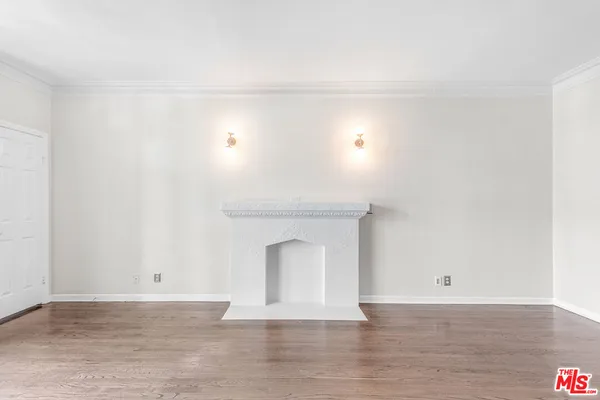wooden floor and white walls