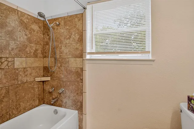 an empty room with fan