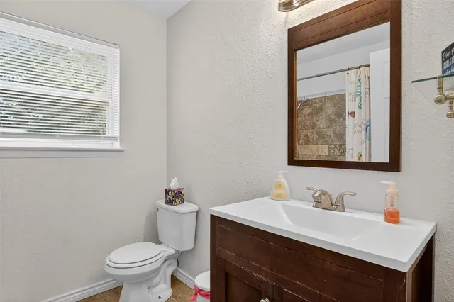 a room with window and ceiling fan