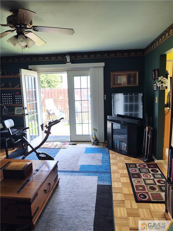 126 Moretti Lane Edison, NJ 08817 - Photo 19 of 33 a room with furniture and a flat screen tv