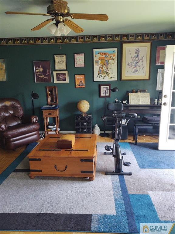 126 Moretti Lane Edison, NJ 08817 - Photo 21 of 33 a room with furniture pool table and paintings on the wall