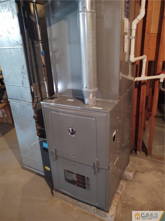 126 Moretti Lane Edison, NJ 08817 - Photo 26 of 33 a view of water heater room