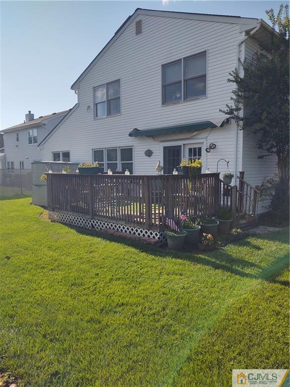 126 Moretti Lane Edison, NJ 08817 - Photo 33 of 33 a view of a house with backyard and a garden