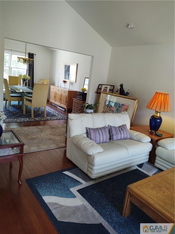 126 Moretti Lane Edison, NJ 08817 - Photo 6 of 33 a living room with furniture and a lamp