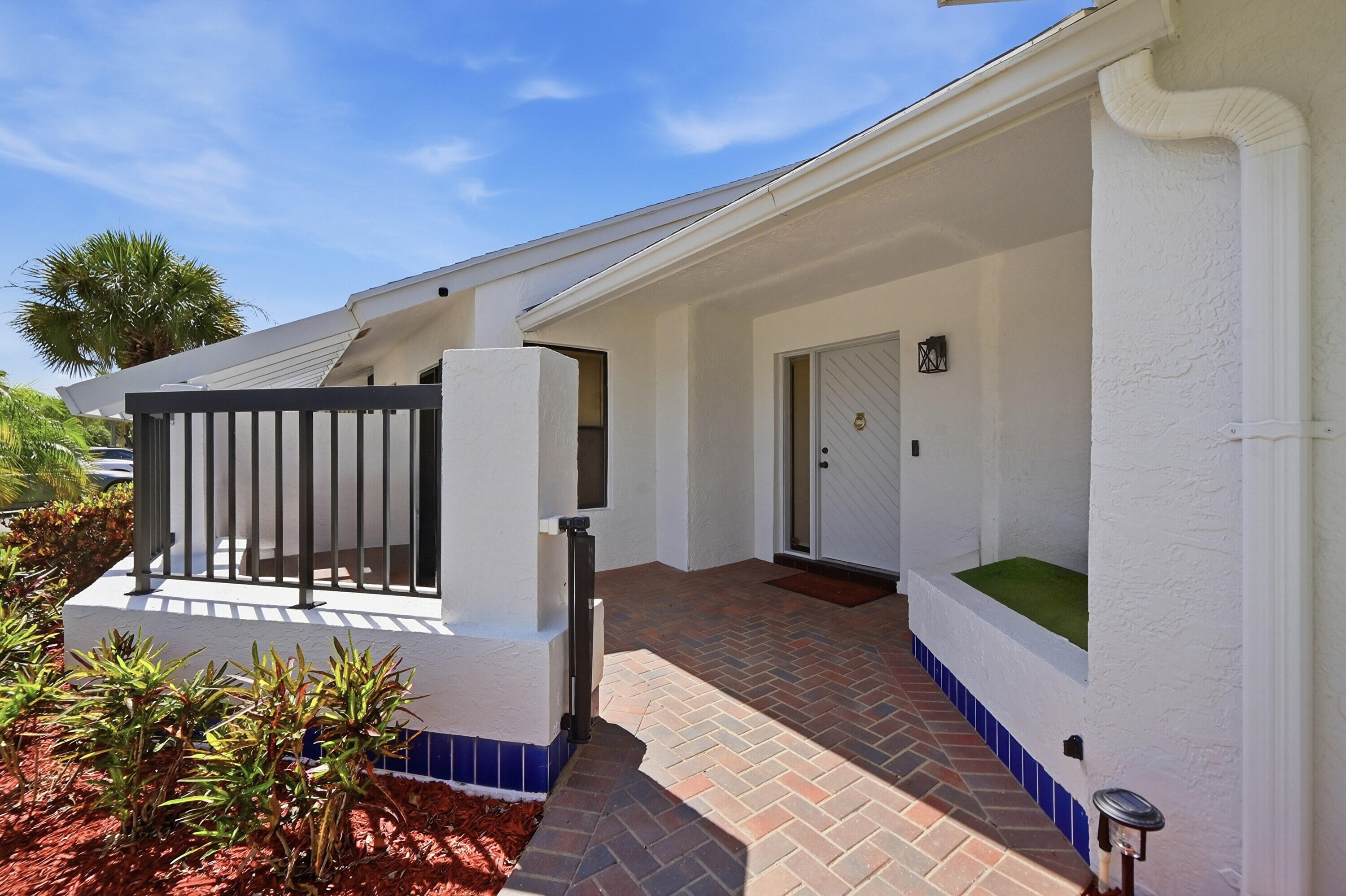10775 Waterberry Drive Boca Raton, FL 33498 - Photo 3 of 42 Front Entry Courtyard