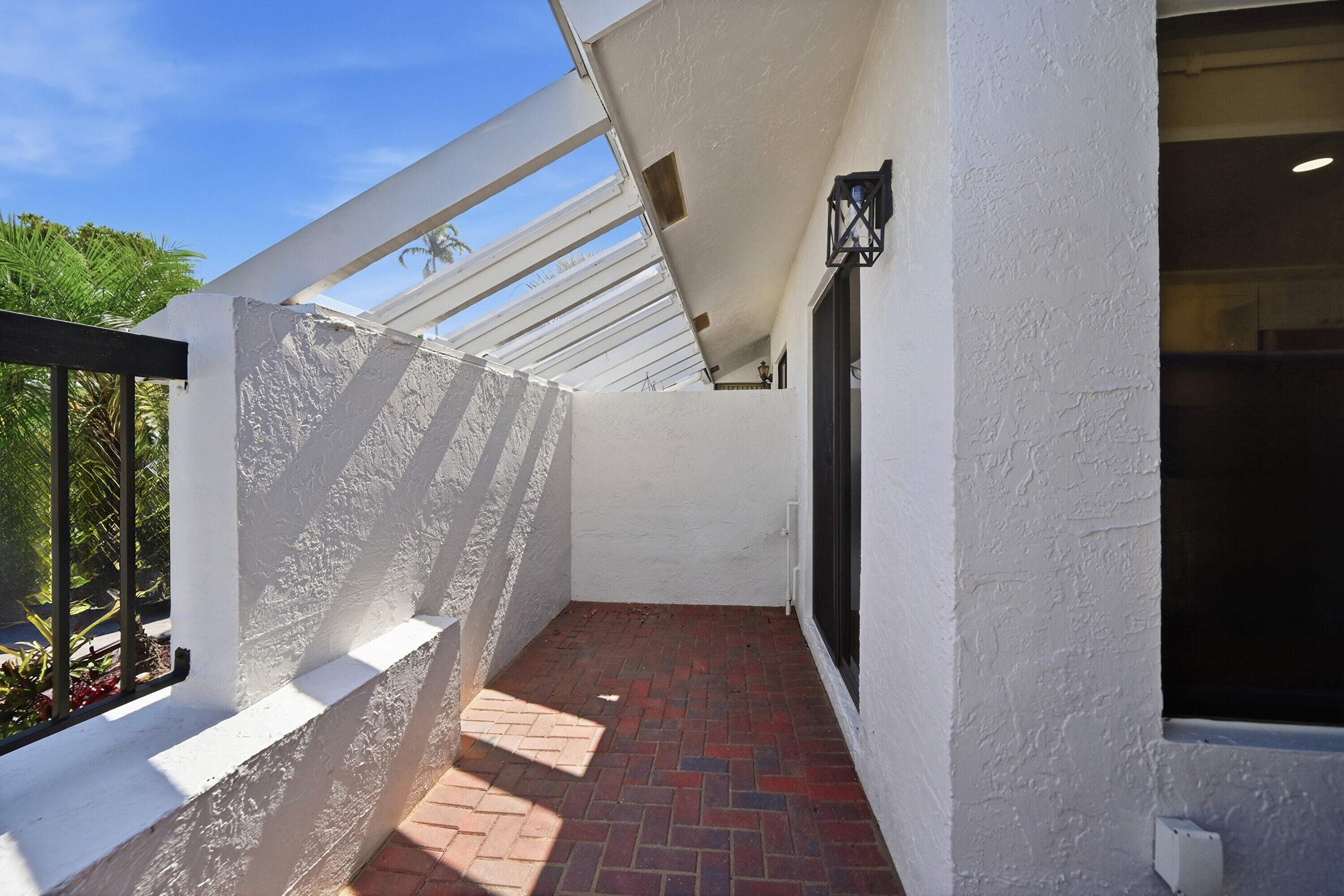 10775 Waterberry Drive Boca Raton, FL 33498 - Photo 31 of 42 Front Courtyeard