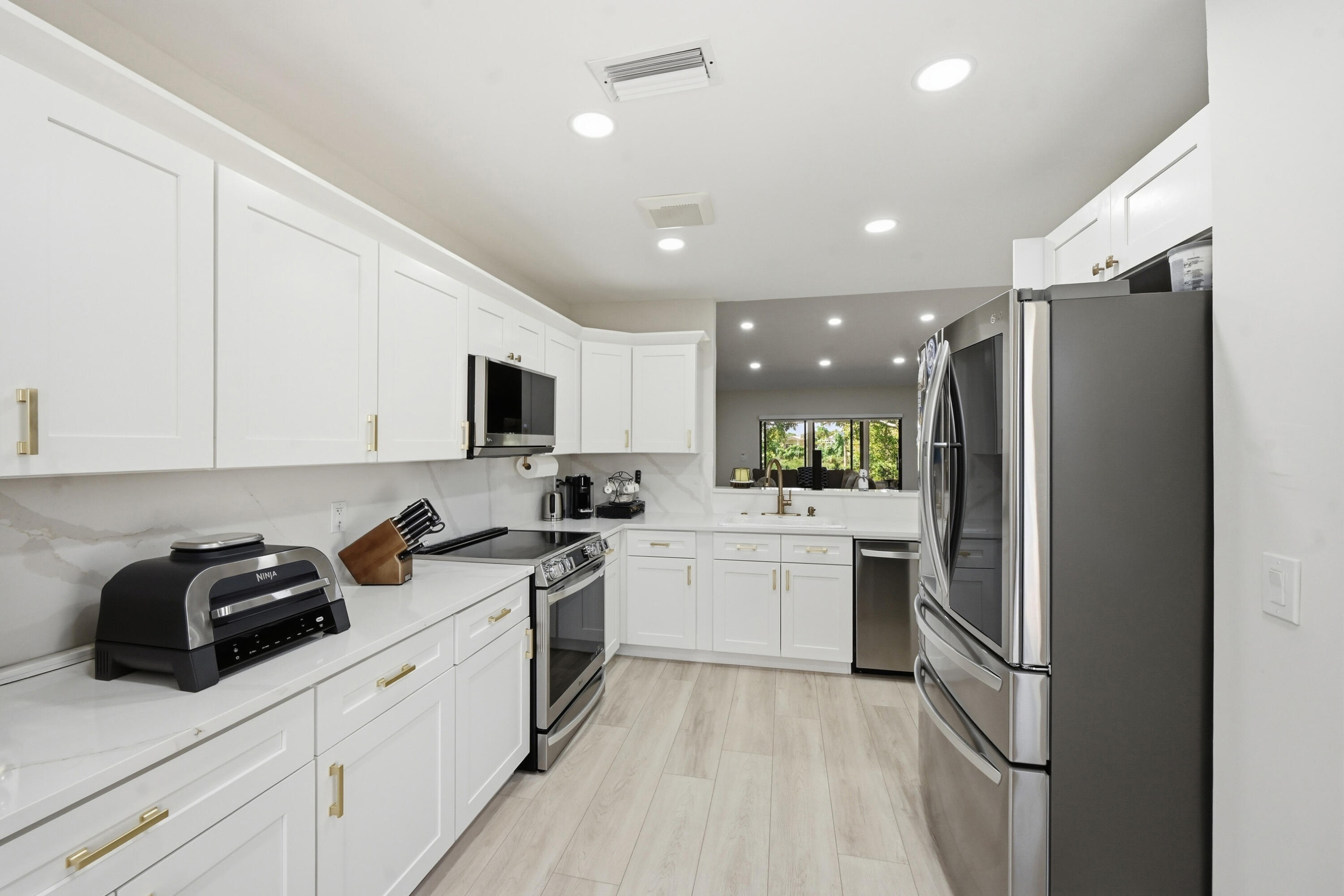10775 Waterberry Drive Boca Raton, FL 33498 - Photo 9 of 42 Kitchen