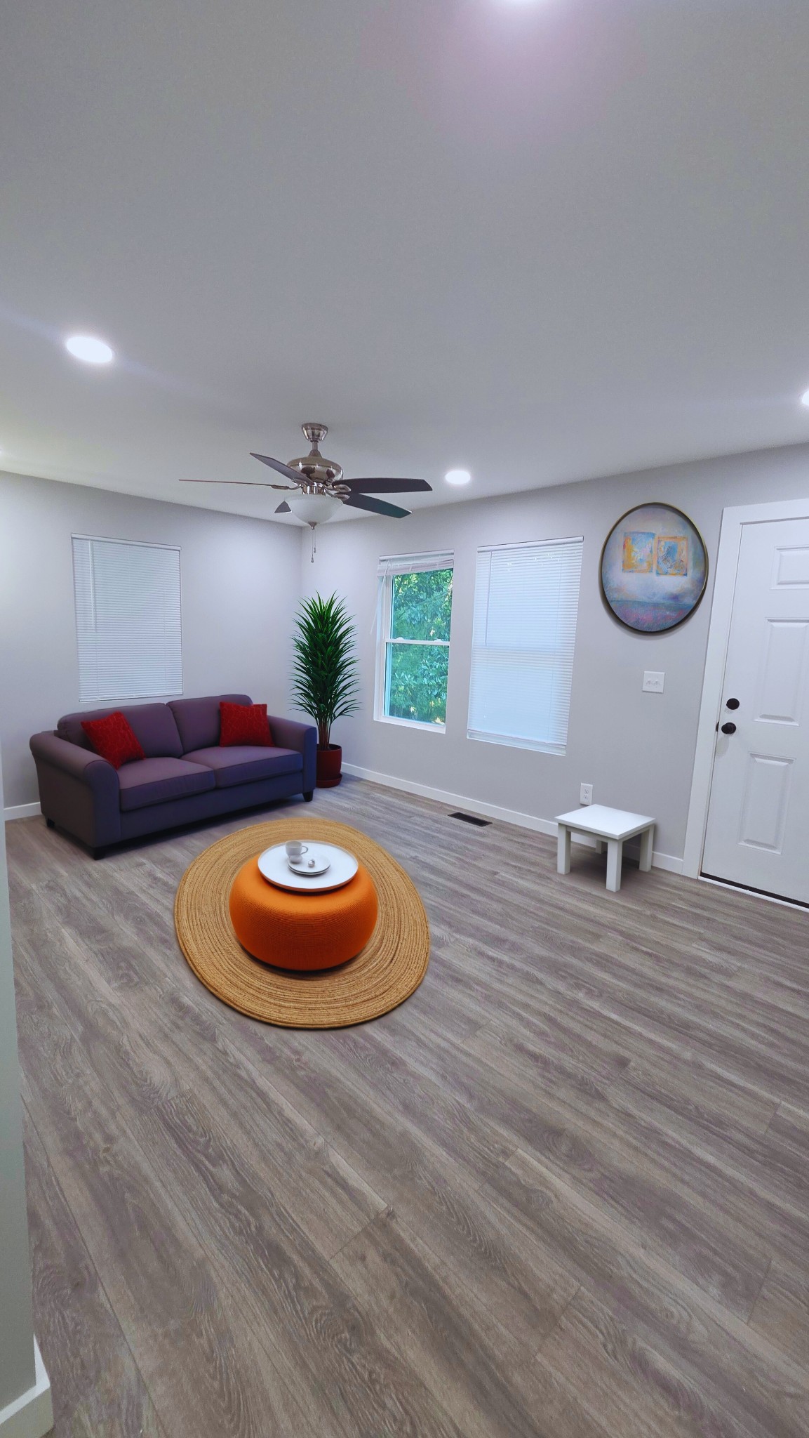 1080 Veterans Road Ashland City, TN 37015 - Photo 11 of 35 a living room with furniture and a wooden floor