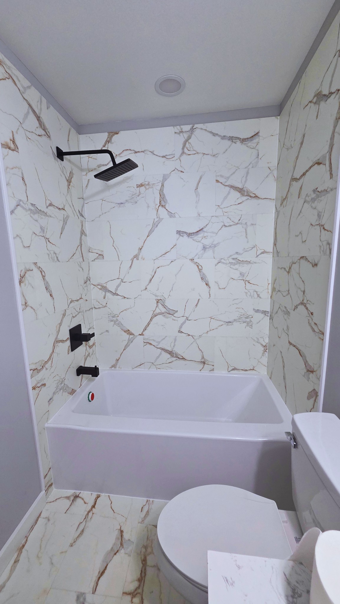 1080 Veterans Road Ashland City, TN 37015 - Photo 26 of 35 a bathroom with a bathtub and a toilet