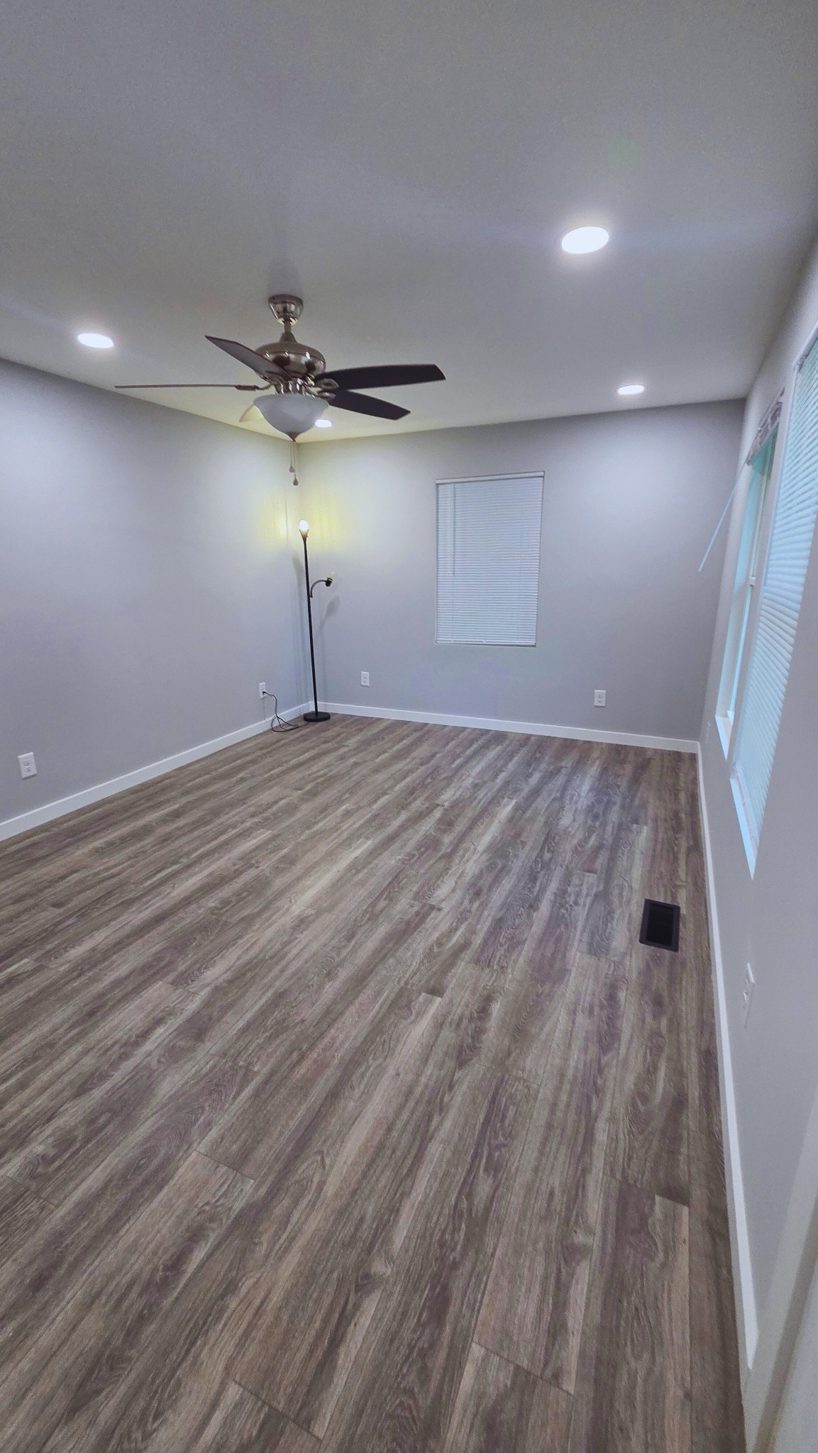 1080 Veterans Road Ashland City, TN 37015 - Photo 10 of 35 wooden floor in an empty room with a window
