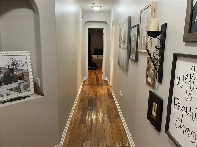 a bedroom with a bed and a desk