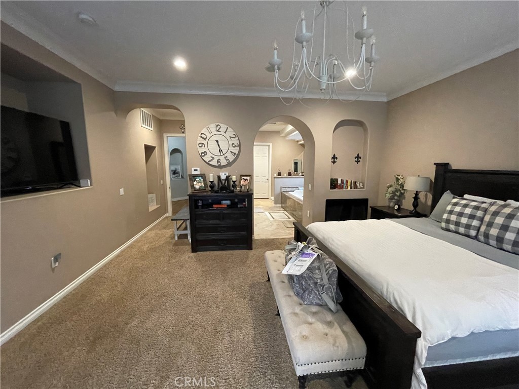 25452 Edna Road Murrieta, CA 92562 - Photo 23 of 70 a large kitchen with a table and chairs