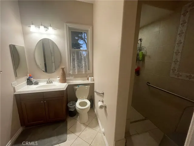 a view of a porch with chairs and backyard