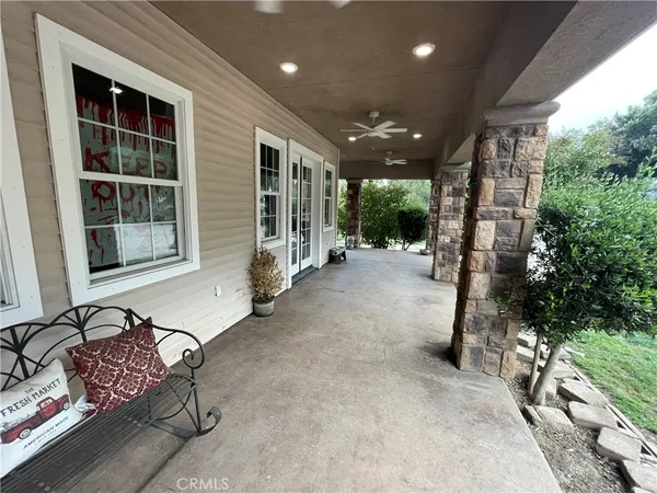 a view of a table and chairs in the patio