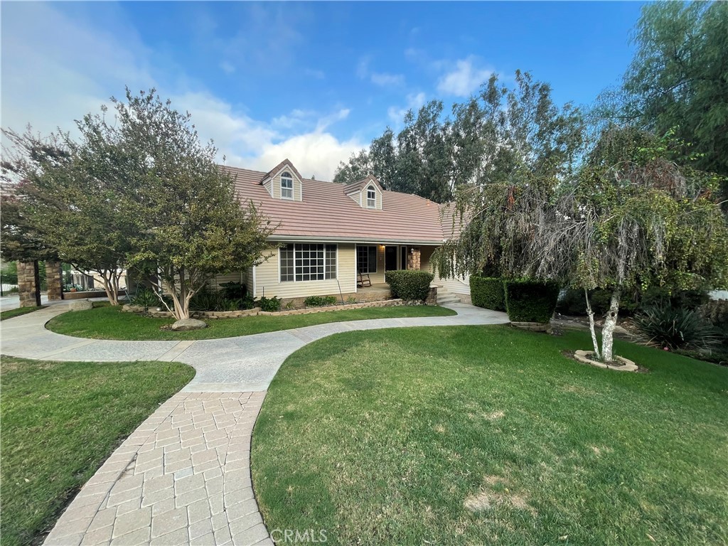 25452 Edna Road Murrieta, CA 92562 - Photo 32 of 70 a front view of a house with a yard