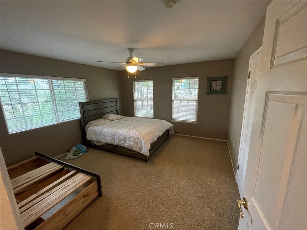 25452 Edna Road Murrieta, CA 92562 - Photo 34 of 70 a bedroom with a bed and window
