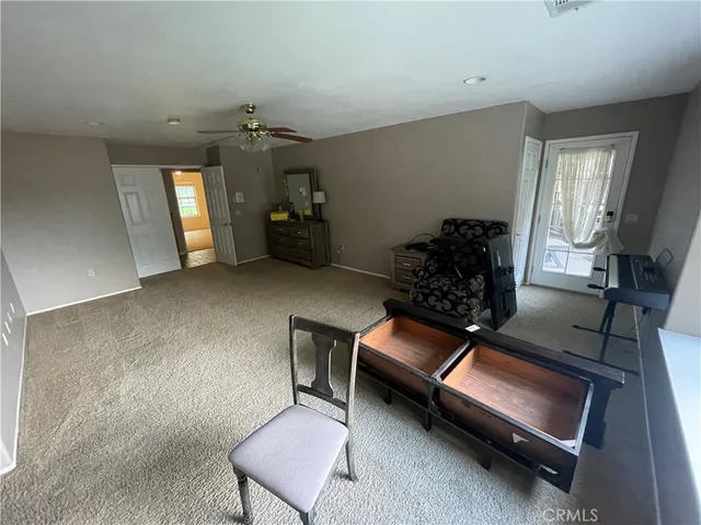 a view of swimming pool with a yard in the back