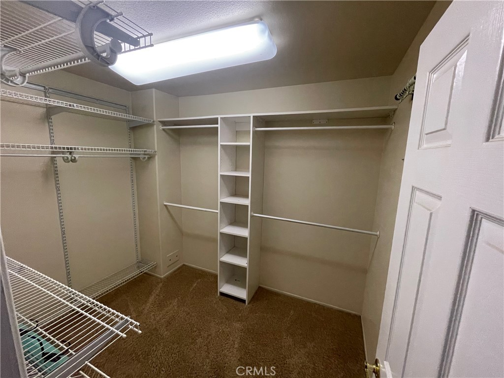 25452 Edna Road Murrieta, CA 92562 - Photo 40 of 70 a view of a room with racks on the wall