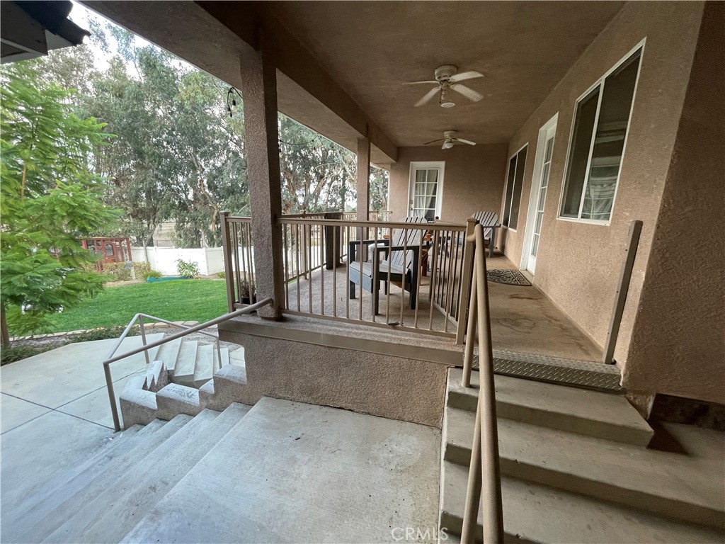 25452 Edna Road Murrieta, CA 92562 - Photo 45 of 70 a view of a porch with chairs and backyard