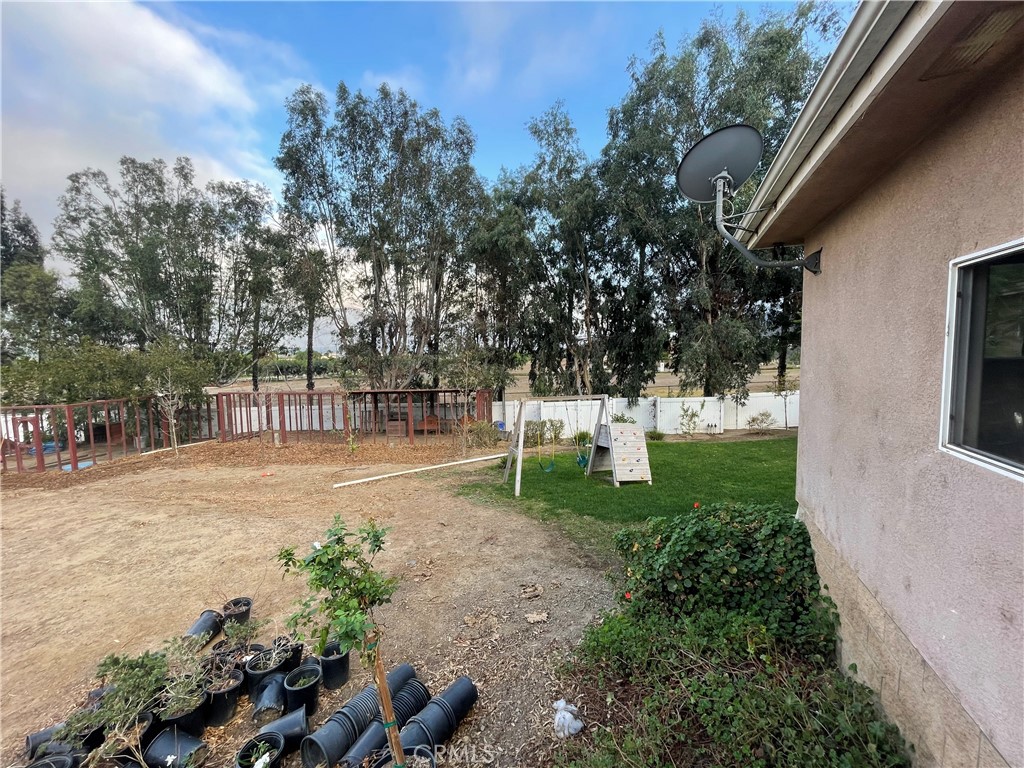 25452 Edna Road Murrieta, CA 92562 - Photo 53 of 70 a view of a park with swings and slides