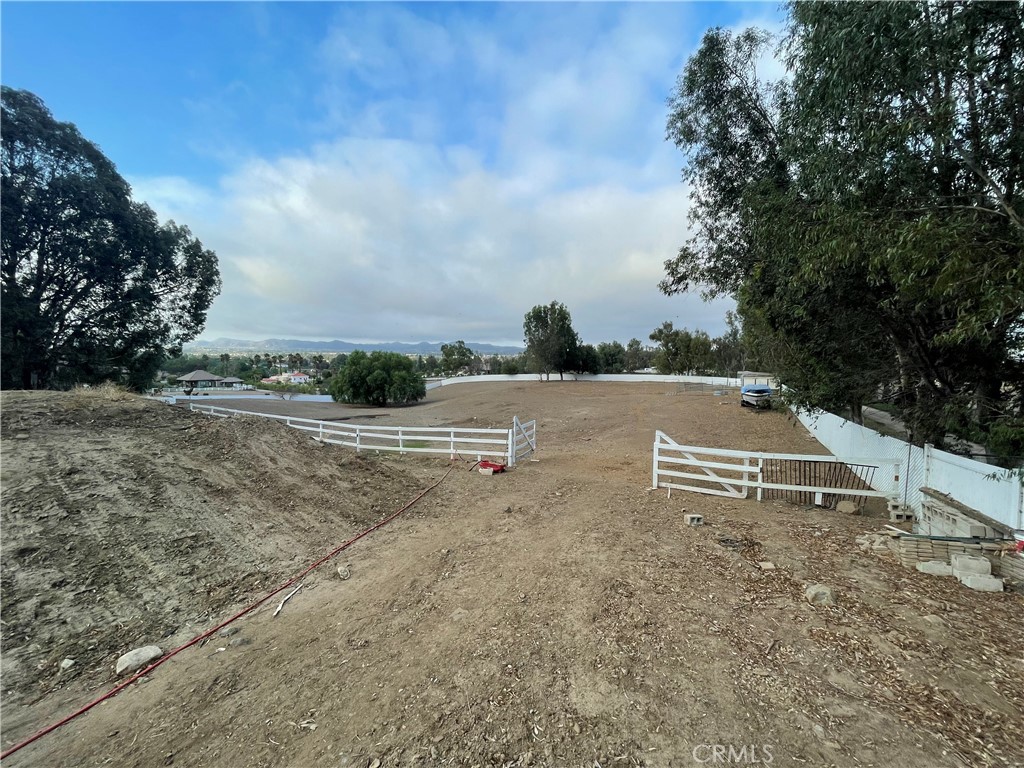 25452 Edna Road Murrieta, CA 92562 - Photo 56 of 70 a view of a big yard with plants and large trees