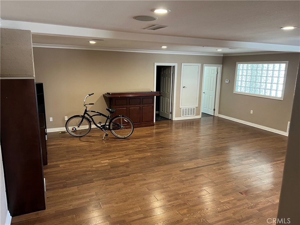 25452 Edna Road Murrieta, CA 92562 - Photo 62 of 70 a view of a livingroom with wooden floor