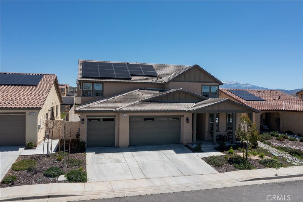 1740 Boysen Way Beaumont, CA 92223 - Photo 2 of 49 a front view of a house with garage