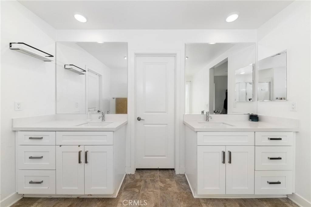 1740 Boysen Way Beaumont, CA 92223 - Photo 31 of 49 a spacious bathroom with a double vanity sink mirror and