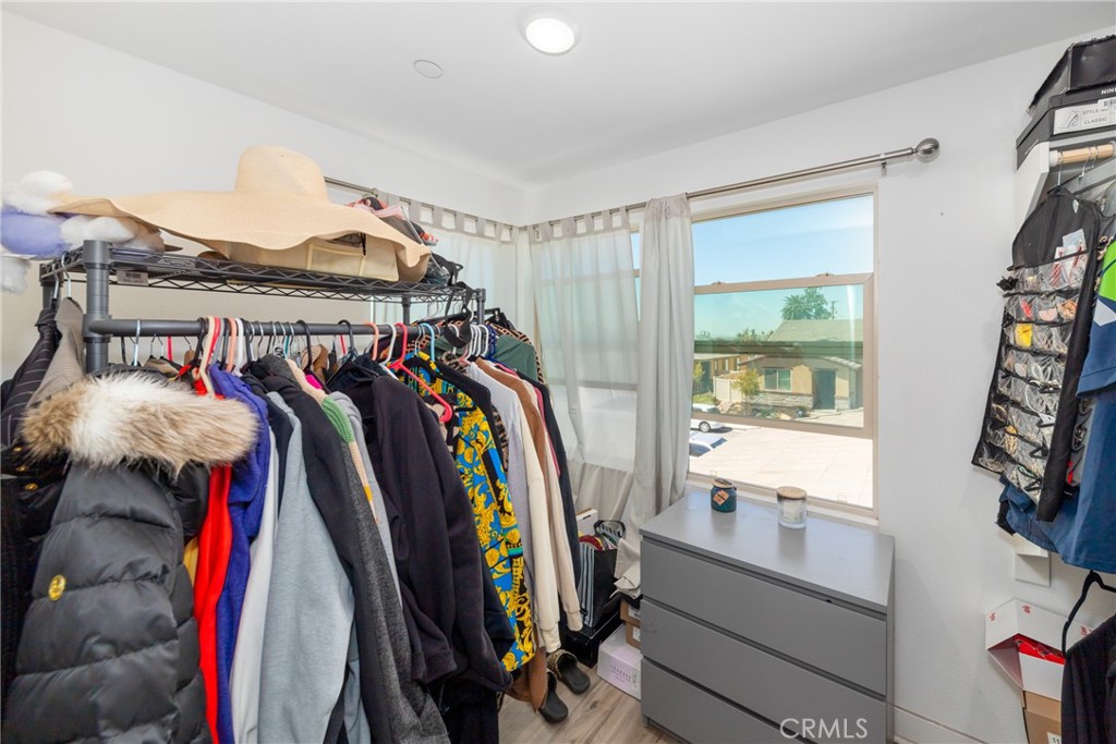 1740 Boysen Way Beaumont, CA 92223 - Photo 33 of 49 a view of walk in closet with clothes and shoes