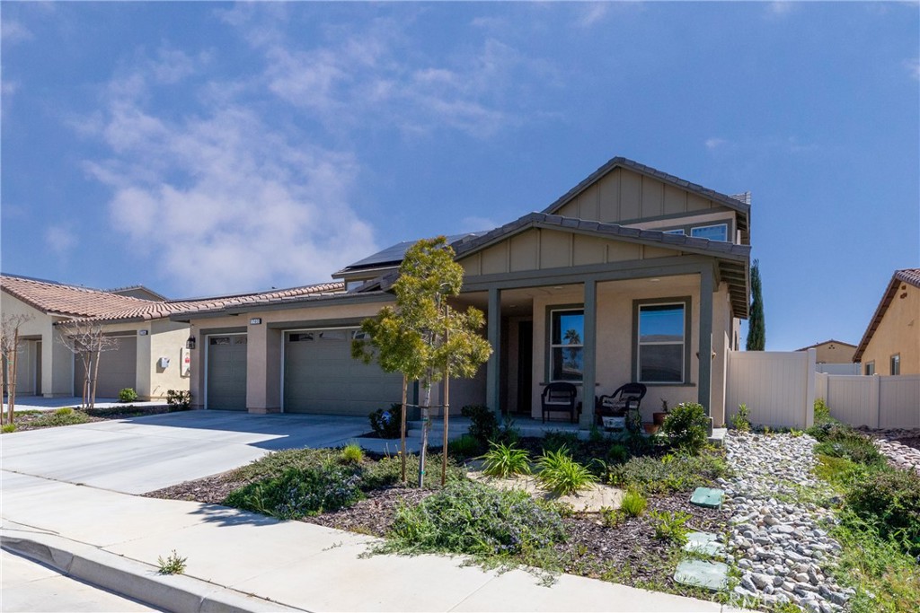 1740 Boysen Way Beaumont, CA 92223 - Photo 4 of 49 a front view of a house with garden